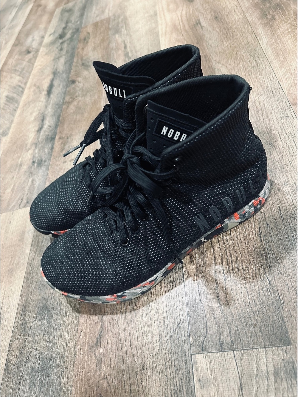 NOBULL black high top trainers